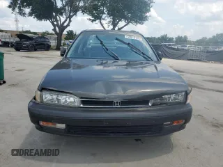 1991 Honda Accord LX z VIN JHMCB7659MC039465, wystawiony jako Copart lot #55810155 z przebiegiem 206 192 mil mil oraz Szkoda całkowita • Salvage title. Historia ofert i sprzedaży dostępna na DreamBid. Obrazek 5.