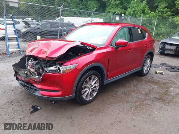 2019 Mazda CX-5 Grand Touring with VIN JM3KFBDM8K0693622, listed as a IAAI auction lot 42503818 with 60,812 mi miles and . Bid and sale history available at DreamBid. Image 17.