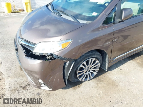 2019 Toyota Sienna XLE Auto Access Seat z VIN 5TDYZ3DC7KS984973, wystawiony jako IAAI lot #42299167 z przebiegiem 75 447 mil mil oraz . Historia ofert i sprzedaży dostępna na DreamBid. Obrazek 6.
