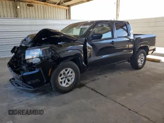 2024 Nissan Frontier SV with VIN 1N6ED1EJ3RN650410, listed as a Copart auction lot 69147654 with 6,483 mi miles and Salvage Title. Bid and sale history available at carsss.com. Image 1.