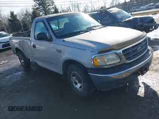 2001 Ford F-150 XL with VIN 1FTZF17201NB45630, listed as a IAAI auction lot 41456984 with 218,331 mi miles and . Bid and sale history available at DreamBid. Image 1.