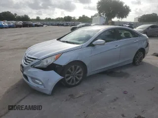 2012 Hyundai Sonata Limited z VIN 5NPEC4AB4CH455218, wystawiony jako Copart lot #60414585 z przebiegiem 195 817 mil mil oraz Szkoda całkowita • Salvage title. Historia ofert i sprzedaży dostępna na DreamBid. Obrazek 1.