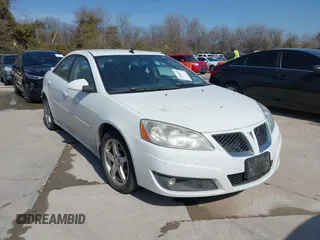 2009 Pontiac G6 GT 1SB z VIN 1G2ZK57K394242345, wystawiony jako IAAI lot #41508038 z przebiegiem 166 732 mil mil oraz . Historia ofert i sprzedaży dostępna na DreamBid. Obrazek 1.