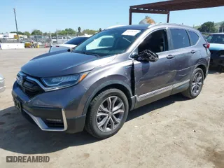 2020 Honda CR-V Hybrid Touring with VIN 7FART6H9XLE006371, listed as a IAAI auction lot 41978709 with 74,695 mi miles. Bid and sale history available at carsss.com. Image 2.