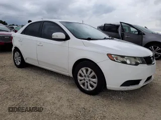 2010 Kia Forte EX with VIN KNAFU4A2XA5843209, listed as a Copart auction lot 74316334 with 144,433 mi miles and Salvage Title. Bid and sale history available at carsss.com. Image 4.