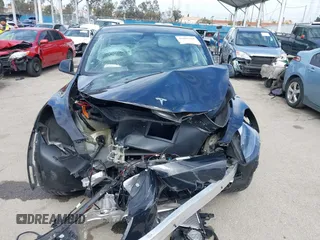 2023 Tesla Model Y Long Range z VIN 7SAYGDEE2PF863200, wystawiony jako IAAI lot #41805168 z przebiegiem 25 480 mil mil oraz . Historia ofert i sprzedaży dostępna na DreamBid. Obrazek 13.