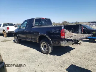 2000 Ford F-150 XL with VIN 1FTRX18W0YKB06899, listed as a Copart auction lot 46170175 with 252,042 mi miles and Salvage Title. Bid and sale history available at carsss.com. Image 2.