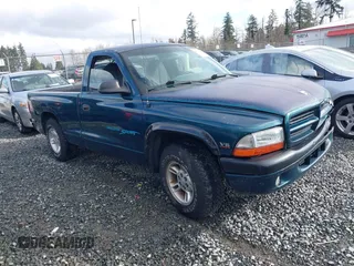 1998 Dodge Dakota SLT with VIN 1B7FL26X4WS692732, listed as a IAAI auction lot 41730518 with 187,285 mi miles. Bid and sale history available at carsss.com. Image 1.