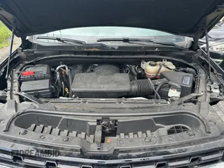 2021 Chevrolet Suburban LS with VIN 1GNSCBKD9MR480205, listed as a Copart auction lot 59422385 with 142,332 mi miles and Salvage title. Bid and sale history available at DreamBid. Image 7.