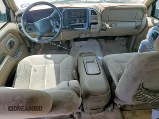 1999 Chevrolet Suburban z VIN 3GNFK16R2XG191868, wystawiony jako Copart lot #57620165 z przebiegiem 128 526 mil mil oraz Szkoda całkowita • Salvage title. Historia ofert i sprzedaży dostępna na DreamBid. Obrazek 8.