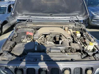2020 Jeep Wrangler Unlimited Sport S z VIN 1C4HJXDG5LW325387, wystawiony jako Copart lot #41467505 z przebiegiem 104 343 mil mil oraz Szkoda całkowita • Salvage title. Historia ofert i sprzedaży dostępna na DreamBid. Obrazek 11.