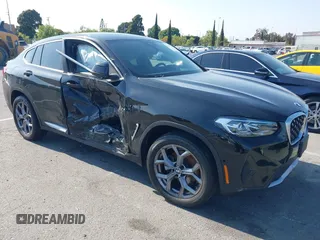 2023 BMW X4 xDrive30i with VIN 5UX33DT09P9S87057, listed as a IAAI auction lot 42141494 with 22,788 mi miles and . Bid and sale history available at DreamBid. Image 1.