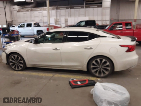2016 Nissan Maxima SL with VIN 1N4AA6AP2GC399721, listed as a IAAI auction lot 41818252 with 64,386 mi miles and . Bid and sale history available at DreamBid. Image 14.