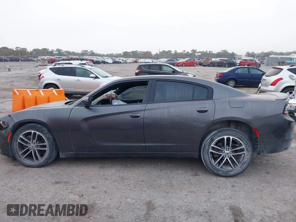 2019 Dodge Charger SXT with VIN 2C3CDXJG1KH730489, listed as a IAAI auction lot 41189171 with 39,514 mi miles and . Bid and sale history available at DreamBid. Image 14.