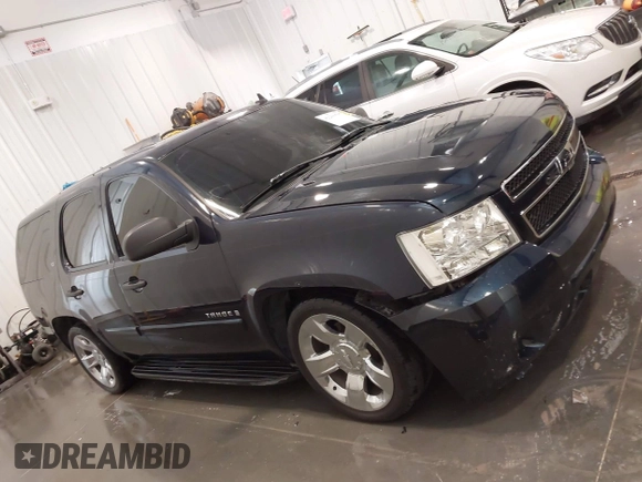 2007 Chevrolet Tahoe LS with VIN 1GNFC13C87R394003, listed as a IAAI auction lot 42206597 with 147,358 mi miles and . Bid and sale history available at DreamBid. Image 13.