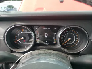 2021 Jeep Gladiator High Altitude z VIN 1C6HJTFG4ML579074, wystawiony jako Copart lot #57145415 z przebiegiem 52 145 mil mil oraz Szkoda całkowita • Salvage title. Historia ofert i sprzedaży dostępna na DreamBid. Obrazek 9.