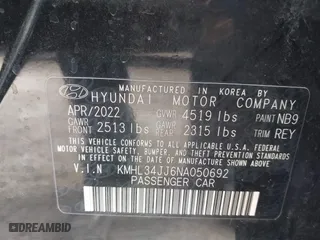 2022 Hyundai Sonata Hybrid SEL with VIN KMHL34JJ6NA050692, listed as a IAAI auction lot 42004770 with 62,514 mi miles. Bid and sale history available at carsss.com. Image 9.