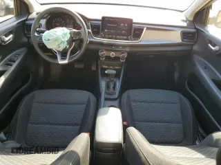 2023 Kia Rio LX with VIN 3KPA24AD6PE572943, listed as a Copart auction lot 48073475 with 34,677 mi miles and Salvage Title. Bid and sale history available at DreamBid. Image 8.