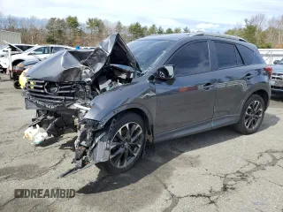 2016 Mazda CX-5 Grand Touring with VIN JM3KE4DY4G0671531, listed as a Copart auction lot 49586545 with 0 mi miles and Salvage Title. Bid and sale history available at carsss.com. Image 1.