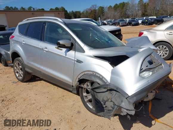 2015 Ford Escape Titanium with VIN 1FMCU0JX2FUB70760, listed as a IAAI auction lot 41649089 with 1 mi miles. Bid and sale history available at carsss.com. Image 1.