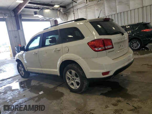 2012 Dodge Journey SXT with VIN 3C4PDCBG0CT174320, listed as a Copart auction lot 65138585 with 156,475 mi miles and Clean title. Bid and sale history available at DreamBid. Image 2.