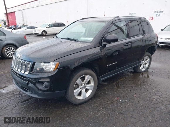 2016 Jeep Compass High Altitude Edition with VIN 1C4NJDEB6GD674564, listed as a IAAI auction lot 41783578 with 98,599 mi miles. Bid and sale history available at carsss.com. Image 2.