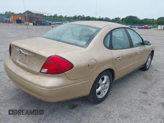 2003 Ford Taurus SES Standard with VIN 1FAFP55213A225447, listed as a IAAI auction lot 42206073 with 177,163 mi miles. Bid and sale history available at carsss.com. Image 6.