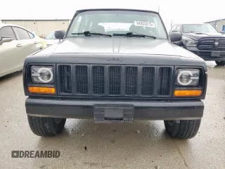 2001 Jeep Cherokee Sport with VIN 1J4FT48S41L535289, listed as a Copart auction lot 54053275 with 227,640 mi miles and Clean Title. Bid and sale history available at carsss.com. Image 6.