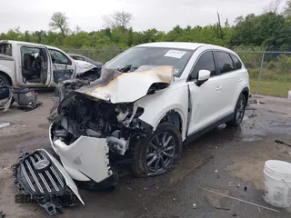 2022 Mazda CX-9 Sport with VIN JM3TCBBYXN0603510, listed as a IAAI auction lot 42027879 with Not provided miles and . Bid and sale history available at DreamBid. Image 2.