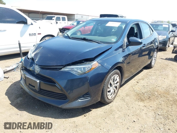 2019 Toyota Corolla L with VIN 2T1BURHE6KC185004, listed as a IAAI auction lot 42105629 with 111,907 mi miles. Bid and sale history available at carsss.com. Image 2.