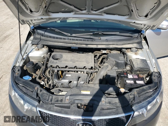 2010 Kia Forte EX z VIN KNAFU4A20A5142825, wystawiony jako Copart lot #74530694 z przebiegiem 125 961 mil mil oraz Szkoda całkowita • Salvage title. Historia ofert i sprzedaży dostępna na DreamBid. Obrazek 11.