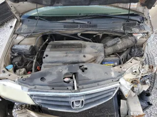 2002 Honda Odyssey EX z VIN 2HKRL18612H503328, wystawiony jako Copart lot #52699095 z przebiegiem 241 741 mil mil oraz Szkoda całkowita • Salvage title. Historia ofert i sprzedaży dostępna na DreamBid. Obrazek 13.