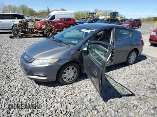 2010 Honda Insight LX z VIN JHMZE2H59AS000085, wystawiony jako Copart lot #54932975 z przebiegiem 218 961 mil mil oraz Szkoda całkowita • Salvage title. Historia ofert i sprzedaży dostępna na DreamBid. Obrazek 1.