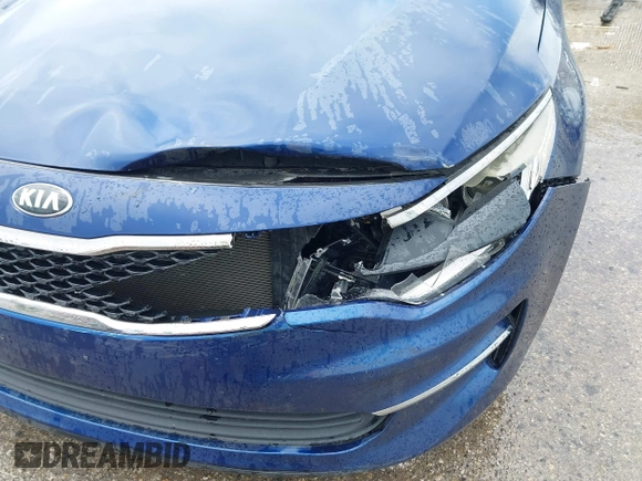2016 Kia Optima LX with VIN 5XXGT4L34GG083587, listed as a IAAI auction lot 42273240 with 87,286 mi miles and . Bid and sale history available at DreamBid. Image 6.