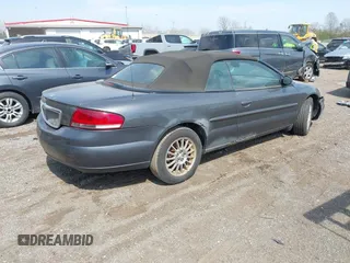 2004 Chrysler Sebring LXi z VIN 1C3EL55R54N391404, wystawiony jako IAAI lot #42051873 z przebiegiem 126 918 mil mil oraz . Historia ofert i sprzedaży dostępna na DreamBid. Obrazek 4.