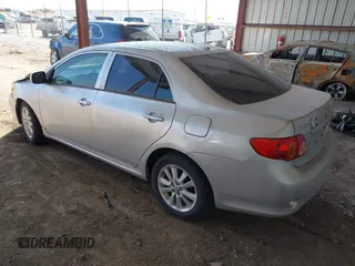 2010 Toyota Corolla with VIN 2T1BU4EE0AC269888, listed as a IAAI auction lot 41926103 with 210,787 mi miles. Bid and sale history available at carsss.com. Image 3.
