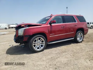 2015 GMC Yukon Denali z VIN 1GKS2CKJ0FR572995, wystawiony jako Copart lot #53357405 z przebiegiem 148 411 mil mil oraz Szkoda całkowita • Salvage title. Historia ofert i sprzedaży dostępna na DreamBid. Obrazek 1.