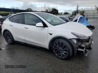2022 Tesla Model Y Performance with VIN 7SAYGDEF3NF390848, listed as a Copart auction lot 49441025 with 42,488 mi miles and Salvage Title. Bid and sale history available at DreamBid. Image 4.