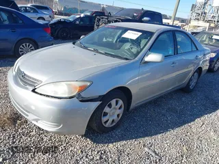 2004 Toyota Camry LE with VIN 4T1BE32K34U819587, listed as a IAAI auction lot 41236808 with 181,377 mi miles and . Bid and sale history available at DreamBid. Image 2.