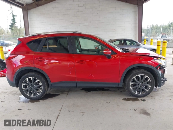 2016 Mazda CX-5 Grand Touring with VIN JM3KE4DY3G0688062, listed as a IAAI auction lot 42025169 with 59,867 mi miles and . Bid and sale history available at carsss.com. Image 14.