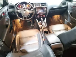 2016 Volkswagen Jetta SEL z VIN 3VWL07AJ1GM375705, wystawiony jako Copart lot #52502345 z przebiegiem 106 185 mil mil oraz Szkoda całkowita • Salvage title. Historia ofert i sprzedaży dostępna na DreamBid. Obrazek 8.
