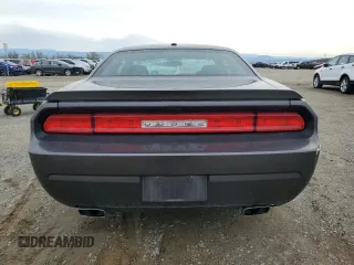 2013 Dodge Challenger R/T z VIN 2C3CDYBT0DH741262, wystawiony jako Copart lot #49185255 z przebiegiem 97 902 mil mil oraz Szkoda całkowita • Salvage title. Historia ofert i sprzedaży dostępna na DreamBid. Obrazek 6.