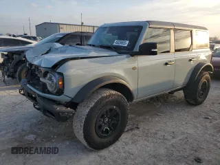 2024 Ford Bronco Wildtrak z VIN 1FMEE2BP4RLA10342, wystawiony jako Copart lot #45039655 z przebiegiem 14 209 mil mil oraz Szkody całkowita. Historia ofert i sprzedaży dostępna na DreamBid. Obrazek 1.