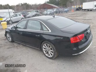 2011 Audi A8 z VIN WAURVAFDXBN026102, wystawiony jako IAAI lot #39096660 z przebiegiem 151 060 mil mil oraz . Historia ofert i sprzedaży dostępna na DreamBid. Obrazek 3.