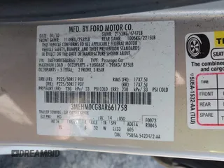 2010 Mercury Milan Premier z VIN 3MEHM0CG8AR661758, wystawiony jako IAAI lot #42170501 z przebiegiem Nie podano mil oraz . Historia ofert i sprzedaży dostępna na DreamBid. Obrazek 9.