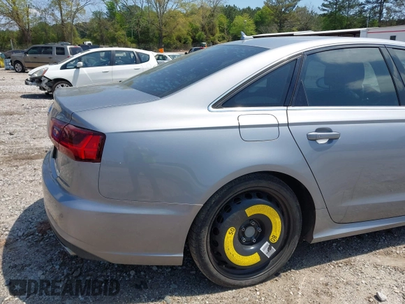 2016 Audi A6 Premium z VIN WAUCFAFC2GN111968, wystawiony jako IAAI lot #42003738 z przebiegiem 149 089 mil mil oraz . Historia ofert i sprzedaży dostępna na DreamBid. Obrazek 6.