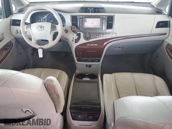 2012 Toyota Sienna XLE AAS с VIN 5TDYK3DC1CS240100, выставлен на аукционе Copart как лот 56975235 с пробегом 251 340 миль миль и Списание • Salvage title. История ставок и продаж доступна на DreamBid. Изображение 8.