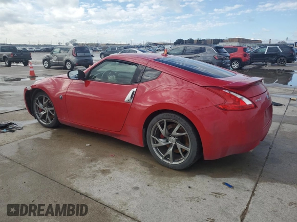 2014 Nissan 370Z Nismo with VIN JN1AZ4EH8EM633462, listed as a Copart auction lot 43250905 with Not Provided miles and Salvage Title. Bid and sale history available at DreamBid. Image 2.