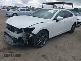 2017 Mazda 6 Grand Touring with VIN JM1GL1X57H1118646, listed as a IAAI auction lot 41896459 with 105,768 mi miles and . Bid and sale history available at carsss.com. Image 2.