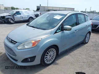 2013 Ford C-Max SEL with VIN 1FADP5BU0DL545491, listed as a IAAI auction lot 42091433 with 133,907 mi miles. Bid and sale history available at carsss.com. Image 2.